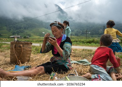 Lao Cai, Vietnam - Sep 7, 2017: Farmer Family Having Lunch On Rice Field In Sapa