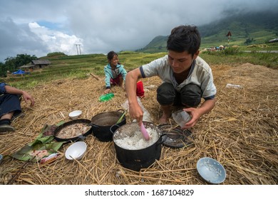 Lao Cai, Vietnam - Sep 7, 2017: Farmer Family Having Lunch On Rice Field In Sapa