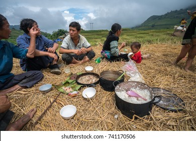 Lao Cai, Vietnam - Sep 7, 2017: Ethnic Minority Farmer Family Having Lunch On Rice Field In Sapa