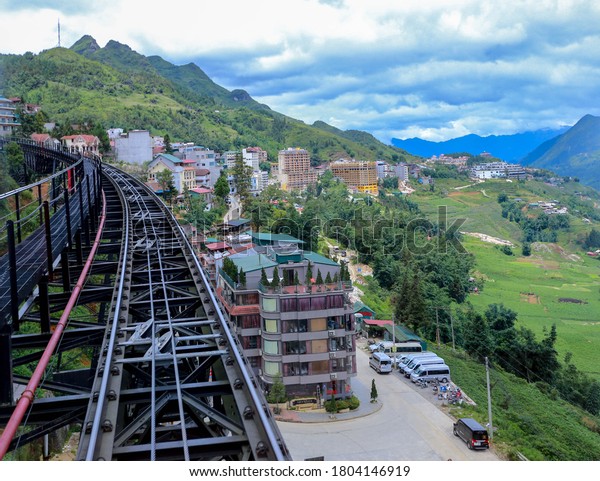Laos Gai, North Vietnam, JULY 06, 2019:\
Train brings tourists up the mountain, transportation to Fansipan\
Cable Car Station in Sa Pa, North\
Vietnam.