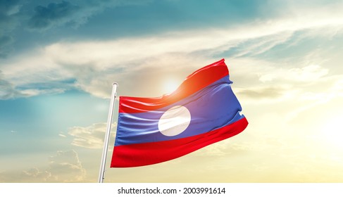Laos national flag waving in beautiful clouds. - Powered by Shutterstock