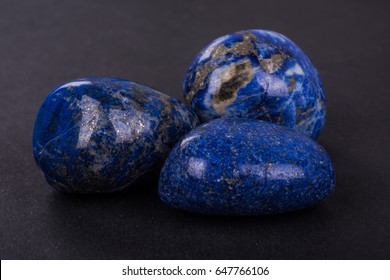 Lapis Lazuli Geode On Black Background. Beautiful Natural Crystal Gemstone.