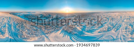 Lapland winter aerial landscape with slopes, skiing resort in Finland