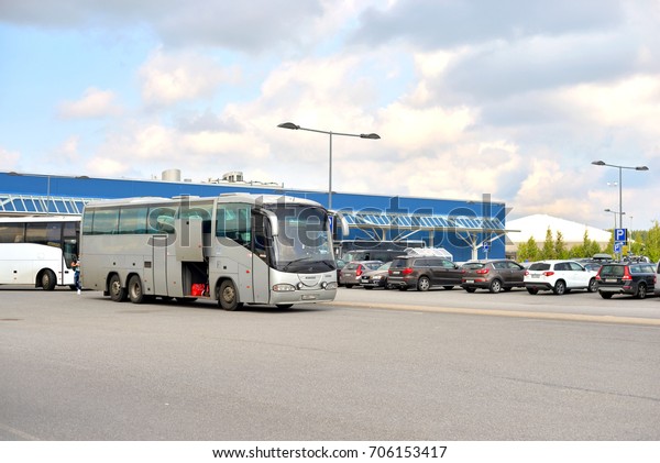 LAPPEENRANTA, FINLAND -\
AUGUST 18, 2017: Parking of the shopping center with tourist buses\
near\
Lappeenranta.