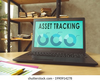 Laptop With Asset Tracking Data On The Screen.