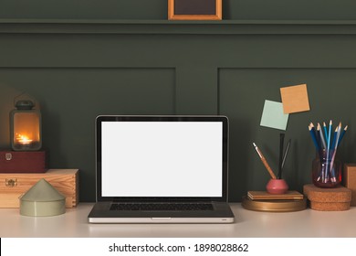 Laptop With Blank Screen On Table In Room. Home Office Space.