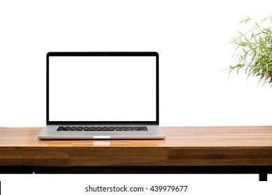 laptop blank screen on wooden table isolated on white background