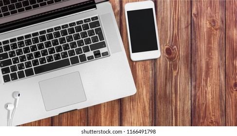 Laptop with blank screen and phone . Isolated  background