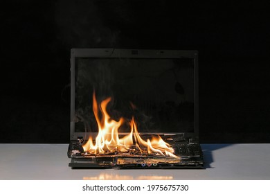 Laptop Burning In Flames On A Desk, Fire Hazard. Losing Valuable Data, 60 Fps