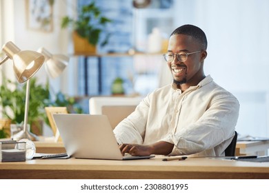 Laptop, business and black man typing, writer and working on web project in office workplace. Smile, computer and African male professional, copywriter and writing email, report or research proposal.