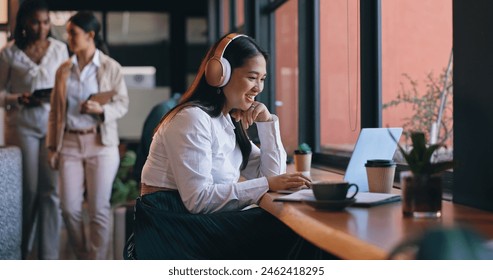 Laptop, business and remote work with asian woman in coffee shop for freelance career as editor or publisher. Computer, email and networking with happy young entrepreneur in cafe or restaurant - Powered by Shutterstock