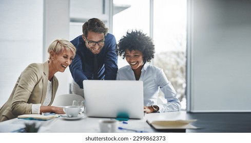 Laptop, collaboration and business people in the office while working on a company project. Technology, teamwork and team doing corporate research in discussion together with technology in workplace - Powered by Shutterstock