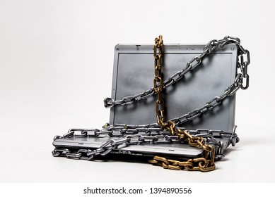 Laptop Computer In Chains Security Danger  Antivirus Stealing Data Password Protection Concept