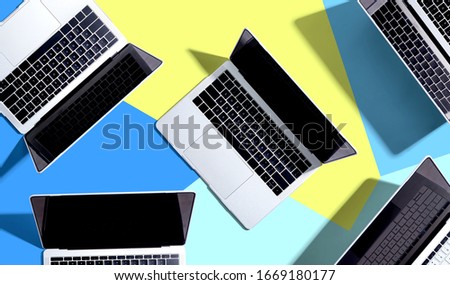 Laptop computer with drop shadow from above