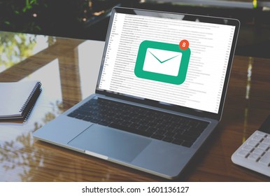 Laptop Computer With Email Communication Connection Message Online And Chat On Social Media With Global Letters Concept. Laptop Mockup With Clipping Path On Screen.