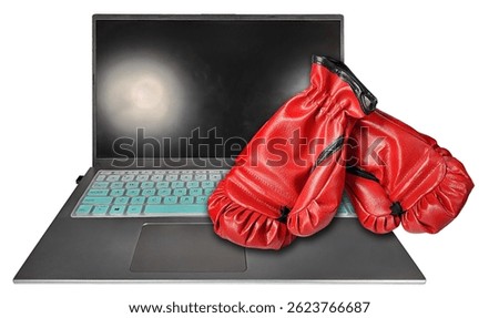 Laptop computer holds lots of computing power with boxing gloves to fight writer's block - Combination of my Photographs - NOT AI Generated.

