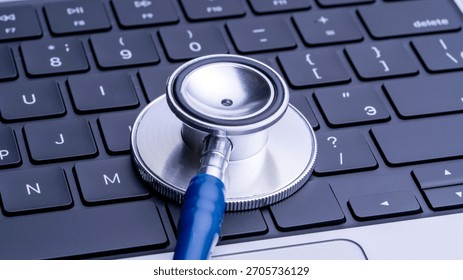 Laptop computer keyboard and stethoscope : the intersection of healthcare and technology in modern medical practice. repair of computers and modern technologies in medicine for diagnosis