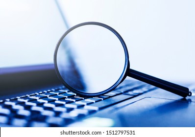 Laptop Computer With Magnifying Glass, Concept Of Search