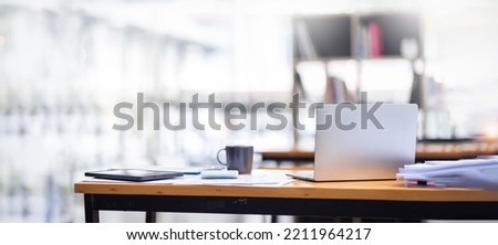 Laptop Computer, Minimal background image of inviting empty workplace with white desk and succulent plant in foreground, copy space after working hours