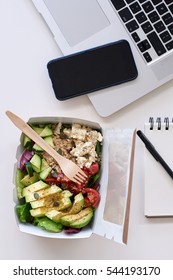 Laptop Computer, Mobile Cell Phone And Healthy Takeout Salad, For Food Delivery Takeout Application Use