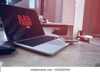 Laptop Computer And Network Online Application For Buy Product In Black Friday Shopping Discount Sale Season Event Weekend In Supermarket Store Concept