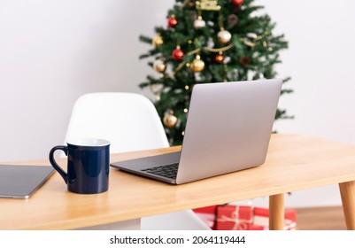 Laptop Computer On Office Table In Christmas Day.  Home Office Desk Workspace. 