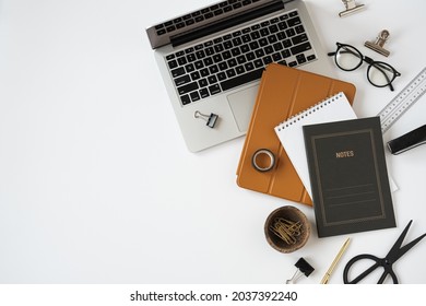 Laptop Computer, Tablet Pad, Notes Sheet On White Table Background. Flat Lay, Top View Aesthetic Minimal Freelancer, Blogger Home Office Workspace