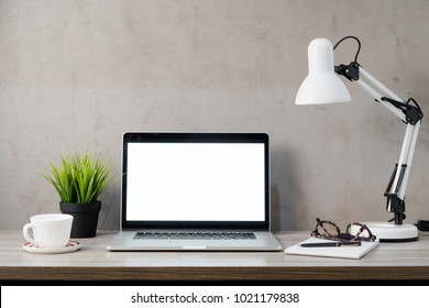 Laptop Computer White Blank Screen On Work Table Front View