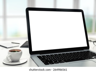 Laptop, Cup And Diary On Table In Office, Shallow Depth Of Field