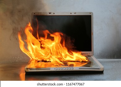 laptop-damage-on-fire-flames-260nw-1167477067.jpg