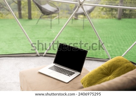laptop in the dome camping, hygge, lifestyle concept