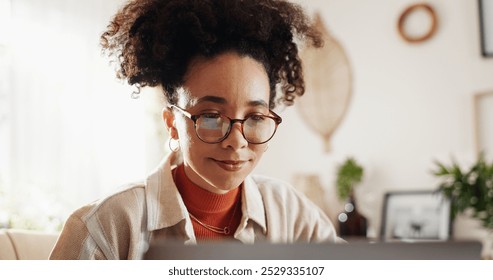 Laptop, glasses and woman at desk in home office with online report, schedule or email. Computer, remote work and consultant reading business plan, article or website for freelance project research