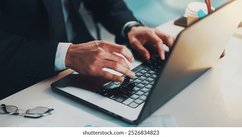 Laptop, hands and typing of report, night and lawyer with deadline, research and working late in office. Dark, keyboard and overtime for person, process and litigation attorney with info for dispute - Powered by Shutterstock