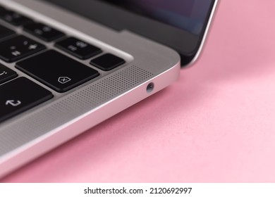 Laptop headphone jack close-up. Modern 3.5mm jack connection. Technology background