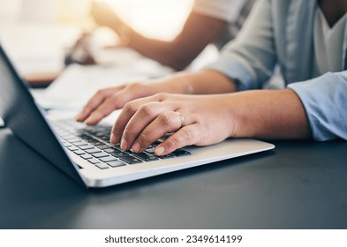 Laptop, keyboard and closeup of woman typing for online research for a project in the office. Technology, hands and female person working on a computer for a creative startup business in a workplace. - Powered by Shutterstock