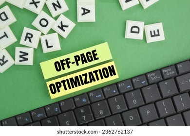 laptop keyboard and colored paper with the word OFF-PAGE OPTIMIZATION