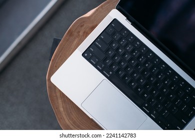 laptop keyboard on wooden table