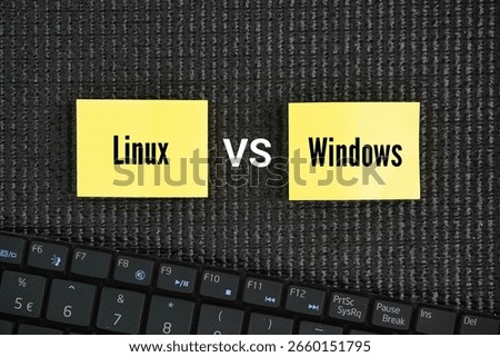 Laptop keyboard with two words linux vs windows. While Windows has long been a dominant player in the consumer market, Linux has emerged as the undisputed champion for programmers.