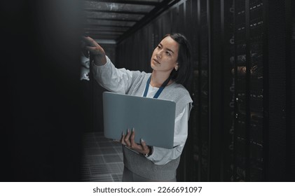Laptop, maintenance or IT woman in server room for research, engineer working in data center. Computer, cybersecurity and girl programmer with tech for problem solving, diagnose or troubleshooting