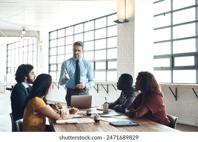 Laptop, manager or businessman in presentation for solution, problem solving or teaching in meeting. Leadership, workshop or mentor talking in team training, coaching class or learning opportunity