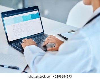 Laptop, Medical And Healthcare With A Doctor Working Online In An Office In The Hospital For Medicine And Insurance. Research, Analysis And Treatment With A Female Health Worker At Work In A Clinic