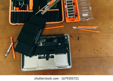 laptop motherboard. repairing broken laptop notebook computer. Electronic repair shop, technology renovation. - Shutterstock ID 1679205721