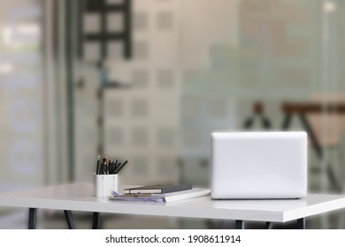 Laptop On Desk With Blur Background. Workspace, Office Room Concept