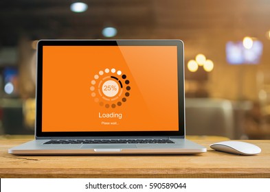 Laptop on table with loading bar load waiting on digital display,  indicator concept. - Powered by Shutterstock