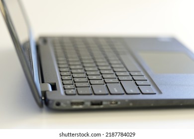 Laptop On White Background, Shallow Depth Of Field.