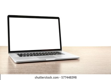 Laptop On Wooden Desk