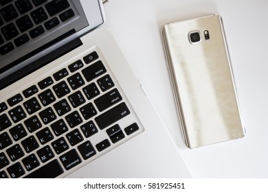 Laptop with Phone, Top View