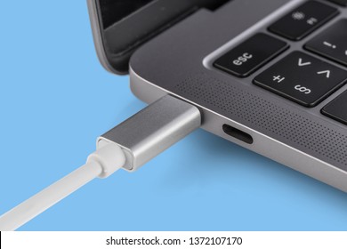 Laptop Power. Cable With Modern Connector For Charging And Syncing Your Laptop With Gadgets. Close-up.