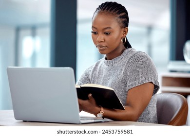 Laptop, reading and black woman in office with notebook, networking and website for online research. Business, planning and sales consultant with notes, computer or internet feedback review at desk. - Powered by Shutterstock