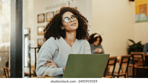 Laptop, remote work and thinking with woman in coffee shop for freelance employment or entrepreneurship. Blog, computer and planning with customer in cafe or restaurant for small business or startup - Powered by Shutterstock